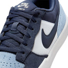 Close-up of the Nike SB Force 58 Light Armory Blue Thunder Photon Dust DV5477-404 suede skateboarding shoes, featuring navy and light blue suede, white midsole, navy Swoosh, and SB Force 58 branding on the tongue.