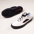 A pair of Light Orewood FV6064104 Malor Nike SB Shoes featuring white uppers, black details and soles, a small red Nike swoosh on the sides, and an extra red swoosh on the sole; one shoe is upright, the other shows its sole.
