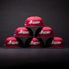 Six Bloodline OG Cardinal Red Houston Astros New Era Hat 5950 Fitted caps are arranged in a pyramid shape against a dark background, each displaying the Astros logo.
