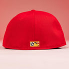 The Crest Lo 2.0 Houston Astros New Era Hat 5950 Fitted is shown from the back on a red background, featuring a small embroidered logo with stars and a yellow baseball outline at the center of the cap.