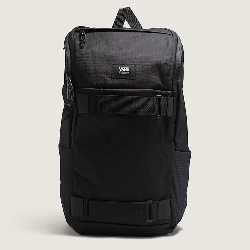 The Obstacle Skatepack Backpack VN0A3I696ZC1 in Black Ripstop by Vans Skateboarding features a top handle, zippered main compartment, front straps, and a small Vans logo patch. Shown against a plain light background.