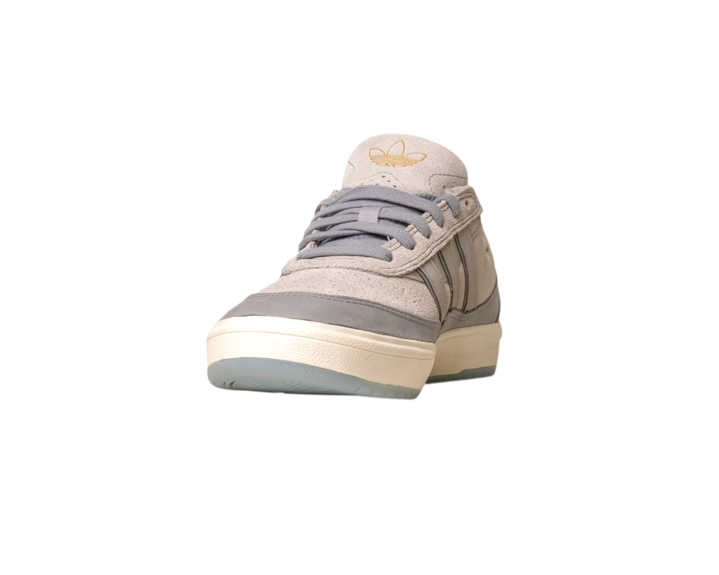 The JI0848 Granite White Tyshawn 2 II Adidas Skateboarding Shoes feature light gray and beige leather and suede, gray laces, and a gold logo on the tongue, shown from the front on a white background.