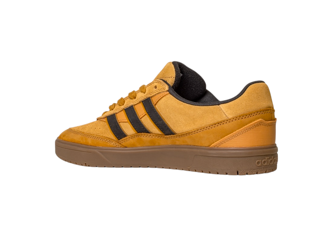The JI0851 Mesa Black Gum Tyshawn II Adidas skateboarding shoe features mustard yellow (Mesa) leather and suede, black stripes, cupsole construction, brown gum sole, yellow laces, and a black inner lining—side view on a white background.