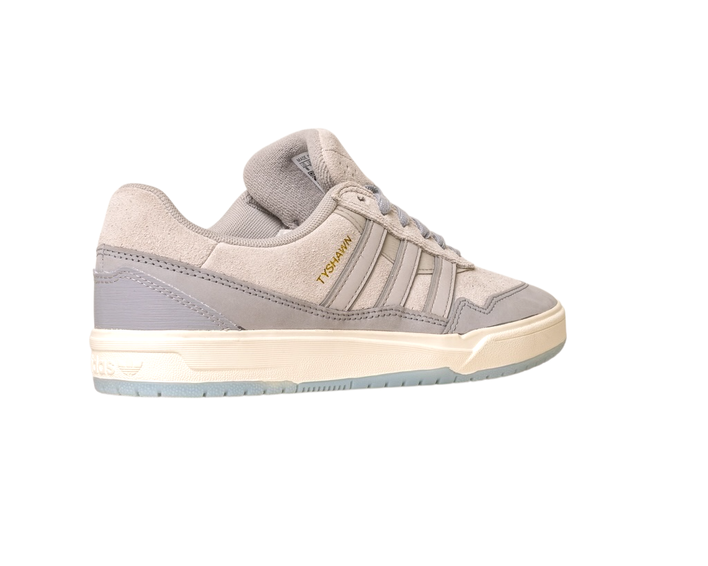 The JI0848 Granite White Tyshawn 2 II Adidas Skateboarding Shoe features light grey suede, grey side stripes, "TYSHAWN" in gold by the laces, and cream and pale blue rubber soles, shown on a white background.