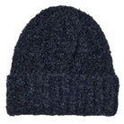 The Polar Beanie Fluff Navy is a dark blue, textured knit hat made from soft teddy yarn, featuring a folded brim and loose fit, shown on a white background.