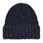 The Polar Beanie Fluff Navy features dark blue boucle knit with a fuzzy teddy yarn texture and a wide ribbed fold-up brim, displayed against a white background.