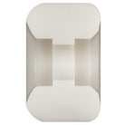 A geometric, reflective object with beveled edges and a central cylindrical section, viewed from above on white—its precise cut-outs evoke the Powell Peralta Nano Rats 93A AV4 Asymmetrical Shape 56mm x 36mm Skateboard Wheels.