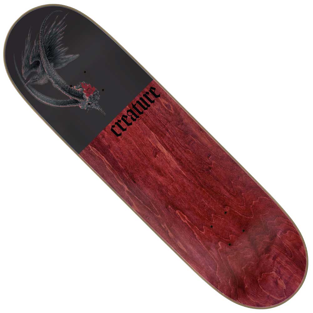 The Provost Guardian Pro Stumps 8.8in x 31.95in Creature Skateboard Deck is crafted from North American Maple, featuring a dark red wood grain and a black top section with a dragon and gothic "creature" lettering.