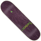 The Provost Skull Spider Pro 8.47in x 31.98in Creature Skateboard Deck features a wood grain purple finish, a small green creature logo at the top, and bold green CREATURE lettering with yellow detail near the bottom right.