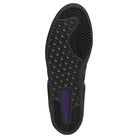 The Purple Black KK0247 Campus ADV Adidas Skateboarding Suede Leather Shoes feature a black sole with a hexagonal tread pattern, highlighted by a purple insert near the heel and additional purple accents in the midfoot area. Inspired by classic Campus ADV skate shoes, this textured sole is built for excellent grip and durability, providing varied grip zones ideal for skateboarding performance.