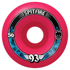 The Radial Pink 56mm93A Formula Four Spitfire Wheels feature a bright pink color, black and blue flame graphics, "SPITFIRE" at the top, 56mm93A on the left, a flame face logo on the right, and "Formula Four" with wings at the bottom.