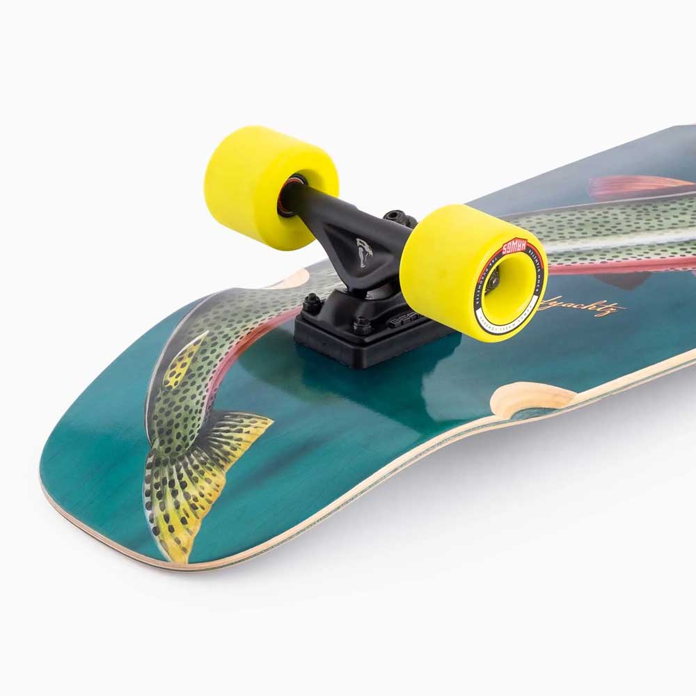 Close-up of the Raft Trout Landyachtz Complete Skateboard, featuring a wide cruiser deck with a detailed trout graphic, bright yellow wheels, and black trucks on a teal blue background—ideal for urban skateboarding enthusiasts.