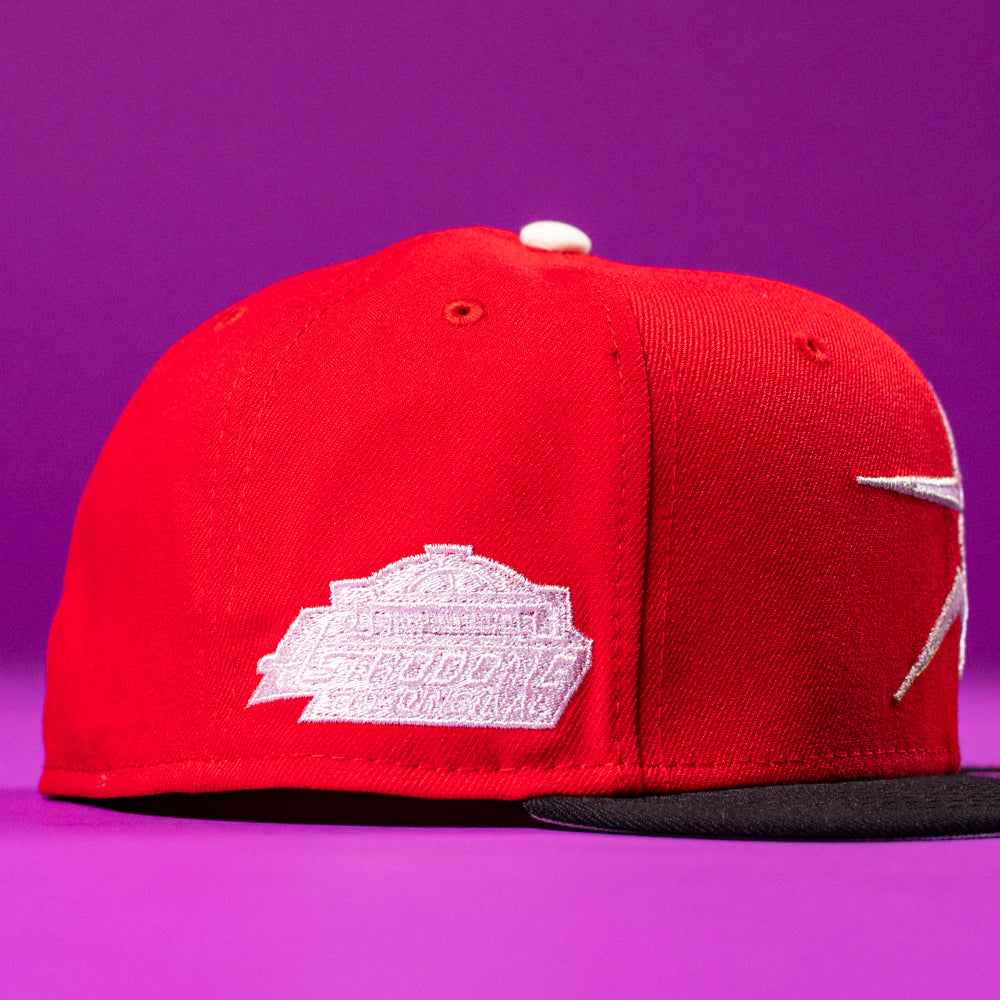 Sabor Fresa New Era Red Houston Astros 5950 Fitted Hat by New Era, featuring a white side patch and black bill, shown on a vibrant purple background.