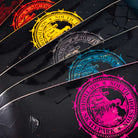 Five Refinery Southside Skateboard Decks by Bigo are displayed in a fan, each featuring a bold South Houston Skatepark circular logo in different colors on black, showcasing the deck’s unique refinery-inspired design and vibrant palette.