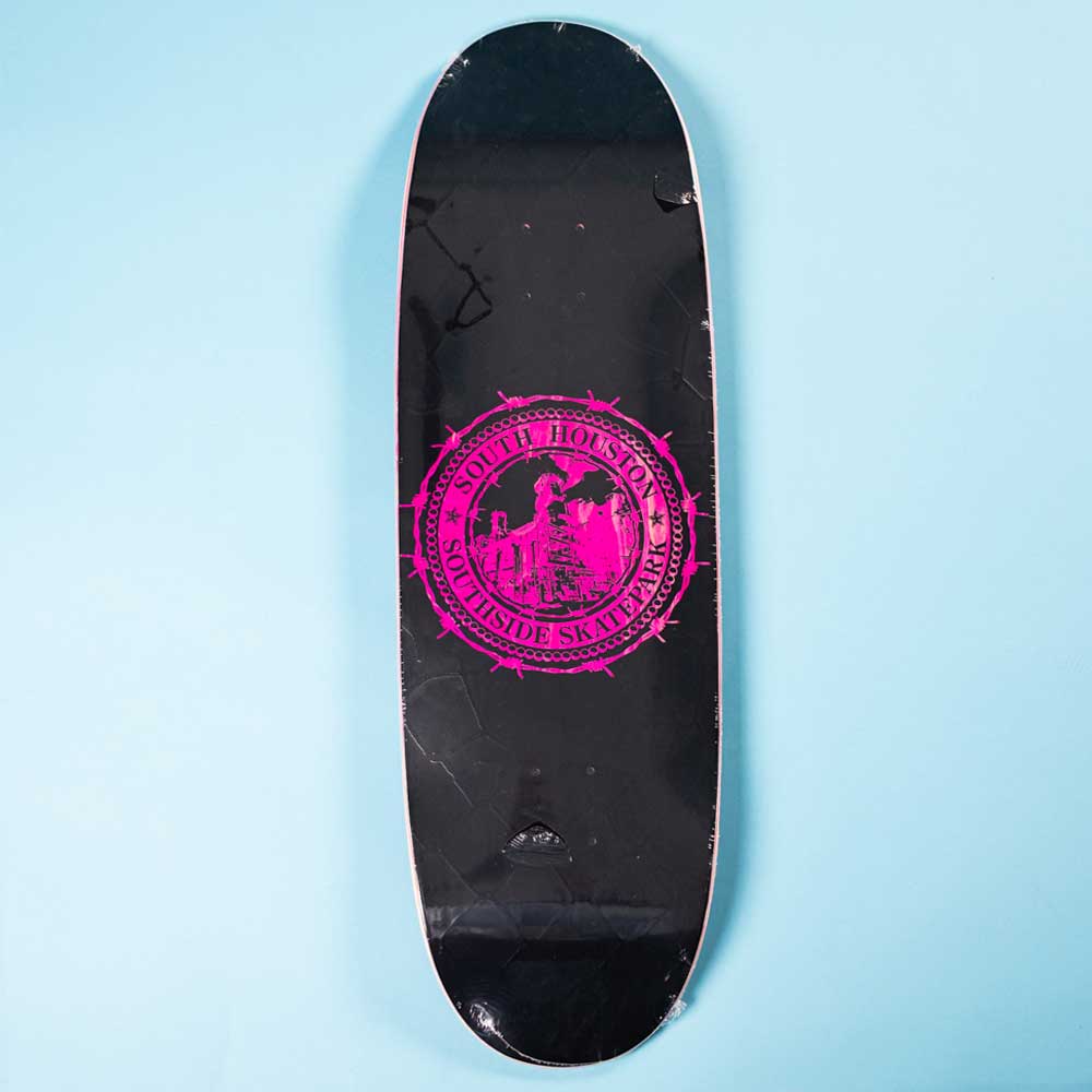 The Refinery Southside Skateboard EGG Deck by Bigo is a black deck with a bold pink Southside Skatepark logo centered on a light blue background, featuring a modern stained veneer icon style.