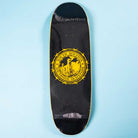 The Refinery Southside Skateboard EGG Deck by Bigo features a black stained veneer, yellow Southside Skatepark logo, unique chain link fence embossment, and comes unused in plastic wrap; shown on a light blue background.