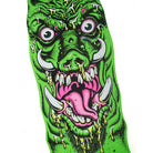 A vivid illustration of a green monster with tusks, bulging eyes, yellow drool, and a pink tongue sticking out is set against a white background—reminiscent of the bold graphics featured on the Roskopp Warthog Freaks 11.00in x 31.445in Santa Cruz Decks.