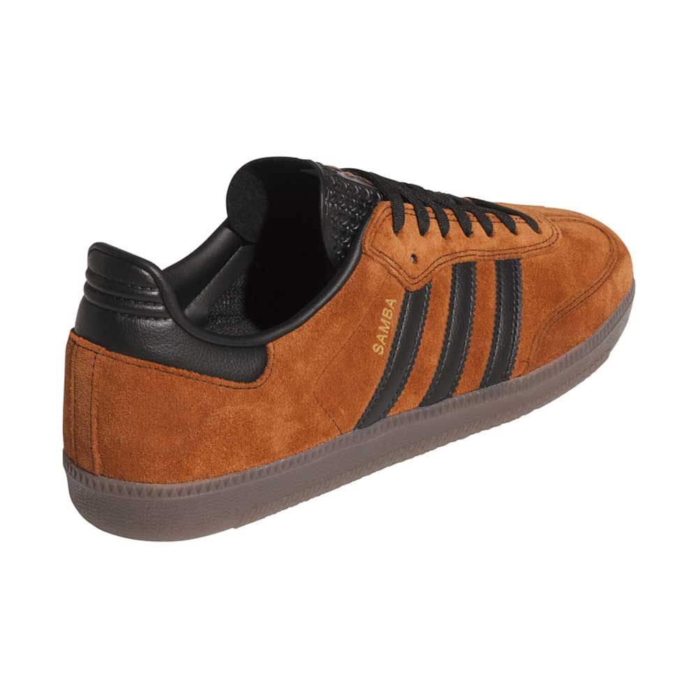The Samba ADV Brown Black HQ9286 Adidas Skateboarding Leather Suede Shoes feature brown leather, black stripes and heel, black laces, a brown gum sole, 'SAMBA' in gold on the side—seen from the back left. Classic skate style.