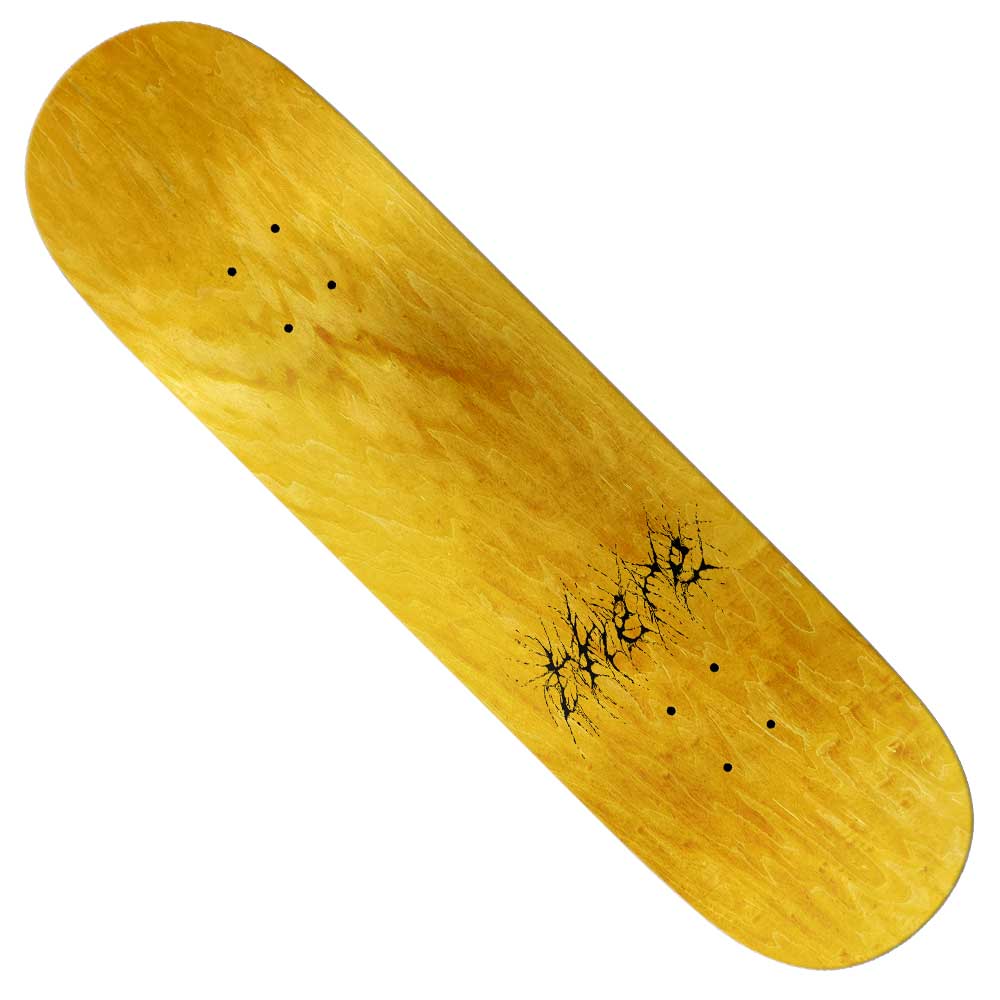 The Shag Sees All 8.25 There Skateboards Deck is yellow, wooden, and 8.25 inches wide, featuring a small black crack-like design near the center. It's photographed on a white background.
