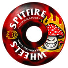 A red skateboard wheel from the Shroom Bighead 56mm99A Classic Full Black Red Swirl Spitfire Wheels, featuring a cartoon red-and-white angry mushroom with yellow flames and bold SPITFIRE branding.