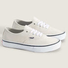 The Skate Authentic White Gunmetal Vans VNOA5FC8XQL Suede White Skateboarding Shoes feature an off-white canvas upper, white laces, rubber soles, and a black-and-white checkerboard design near the eyelets for added style and grip.