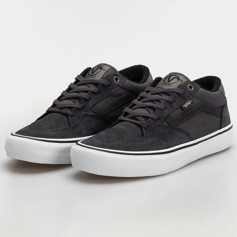 A pair of Vans Skate Rowan Asphalt White VN0A5JICRP9 suede skate shoes with black uppers, white soles, and black laces, inspired by pro skater Rowan Zorilla, displayed on a plain white background.