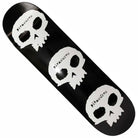 The Skulls 8.5 Pleasures x Zero Skateboards Deck features three white skulls stacked vertically on a black deck, each with "Pleasures" diagonally across the forehead—perfect for fans of bold, street-inspired designs.