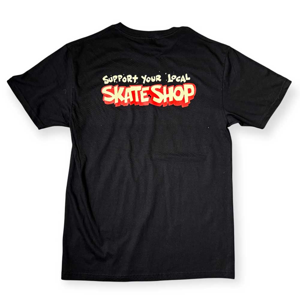 The Southside Support Your Local Skateshop Black Tee Skateshop Day features bold red, yellow, and white SUPPORT YOUR LOCAL SKATE SHOP artwork on the back and is displayed flat against a white background.