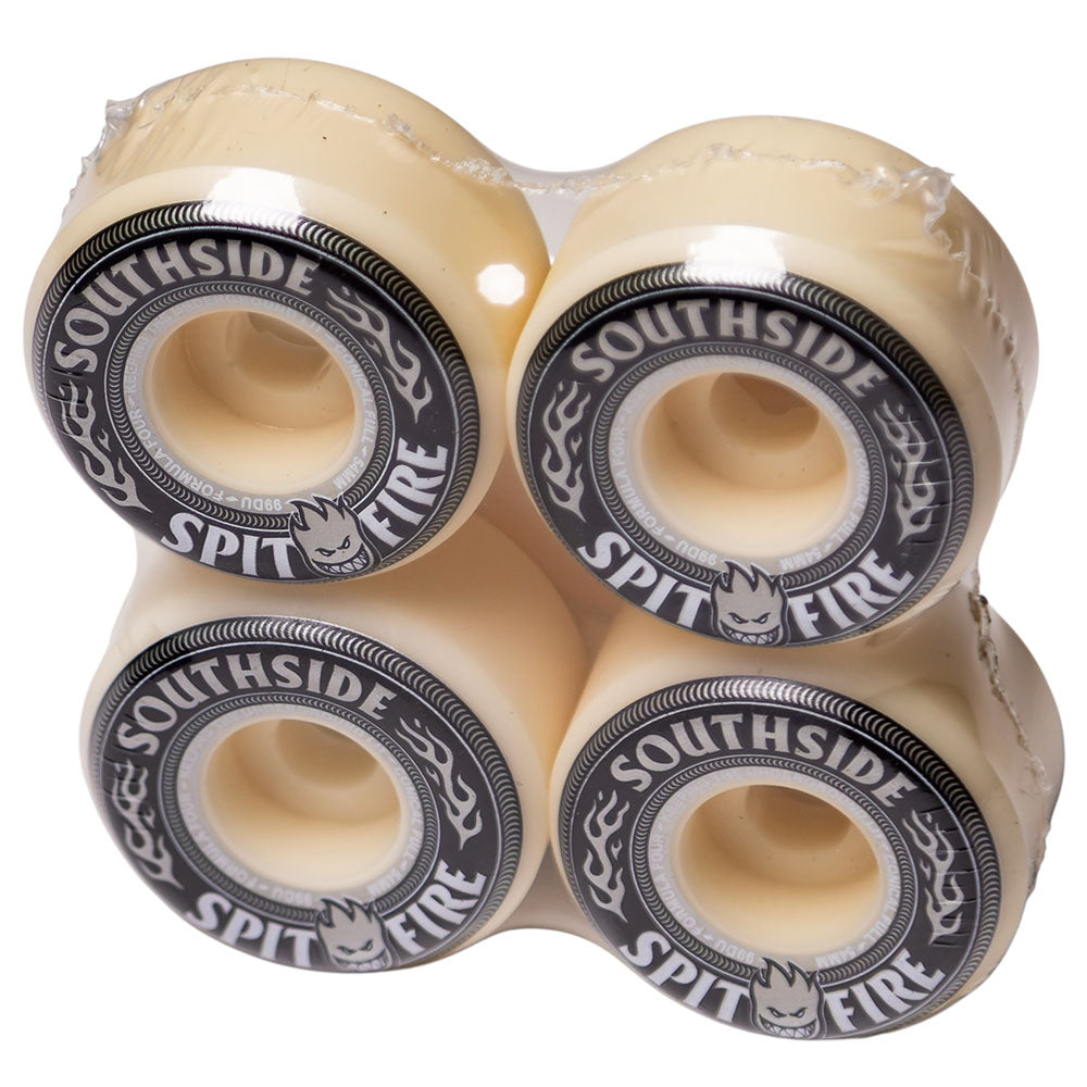 Four black t-shirts packaged with Southside x Spitfire KTUL Pinwheel branding, featuring the iconic Spitfire flame graphic and collaborative logos—a tribute to Southside Skatepark’s legendary skate culture.