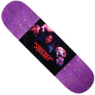 A Violet Skateboards Squeaky Deck Various Stains 8.5 featuring a central graphic of a person holding two colorful puppets, with “SQUEAKY” in red text below the image, inspired by William Strobeck’s distinctive style.