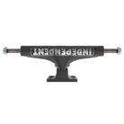 A front view of the 151 Stage 4 Hollow Full Bar Black Standard Trucks (Set of TWO) by Independent shows a black hanger emblazoned with bold white INDEPENDENT lettering, visible bolts at each end—this classic design exemplifies the durability and iconic style skaters expect from Independent Truck Company’s legendary Stage 4 trucks.