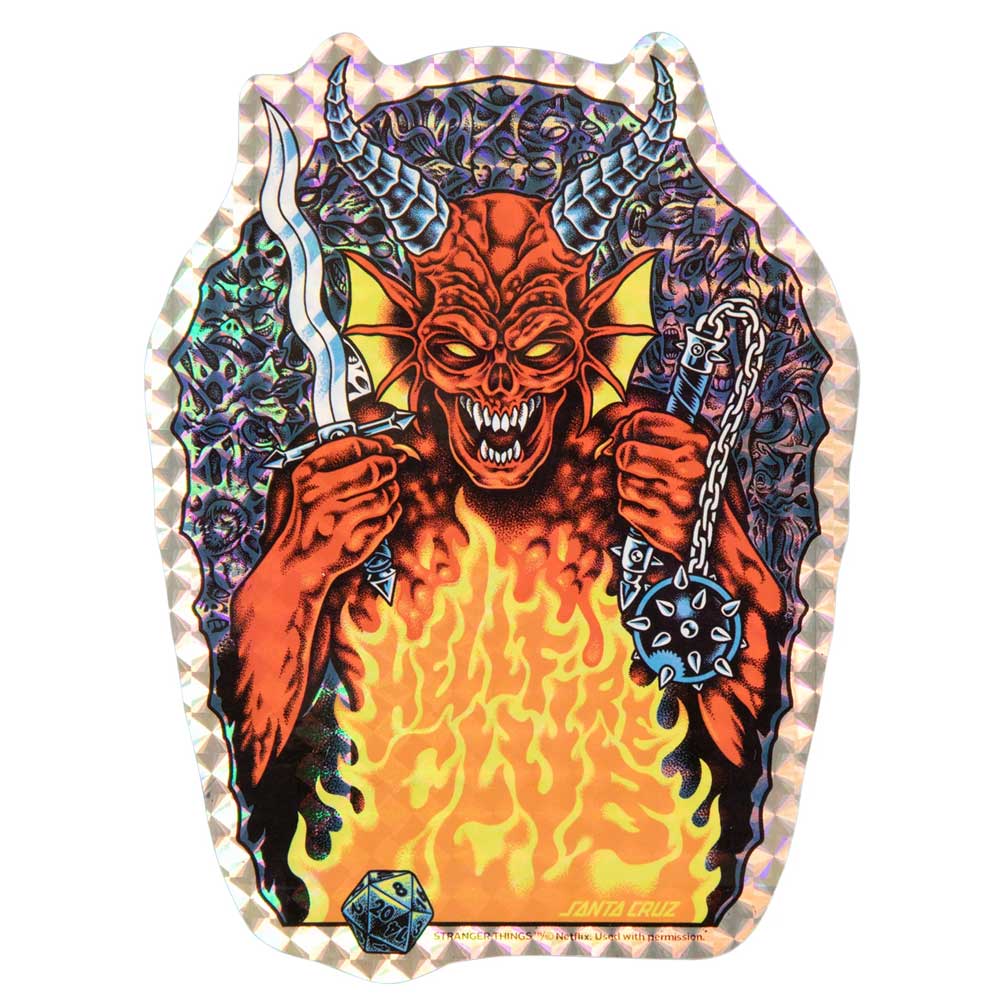 The Stranger Things Knox Hellfire Pit 10.07in x 31.275in Santa Cruz Skateboard Deck features a fierce red demon with horns and weapons rising from flames on a holographic background—ideal for a striking, unique skateboard setup.