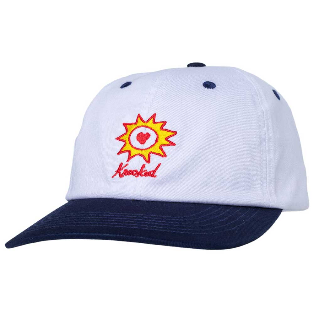 The Sunheart Stripe White Krooked Skateboards Adjustable Snapback Hat features a navy blue brim and showcases an embroidered Sunheart Stripe graphic above the word "Hooked" in red script on the front, highlighting classic Krooked Skateboards style.