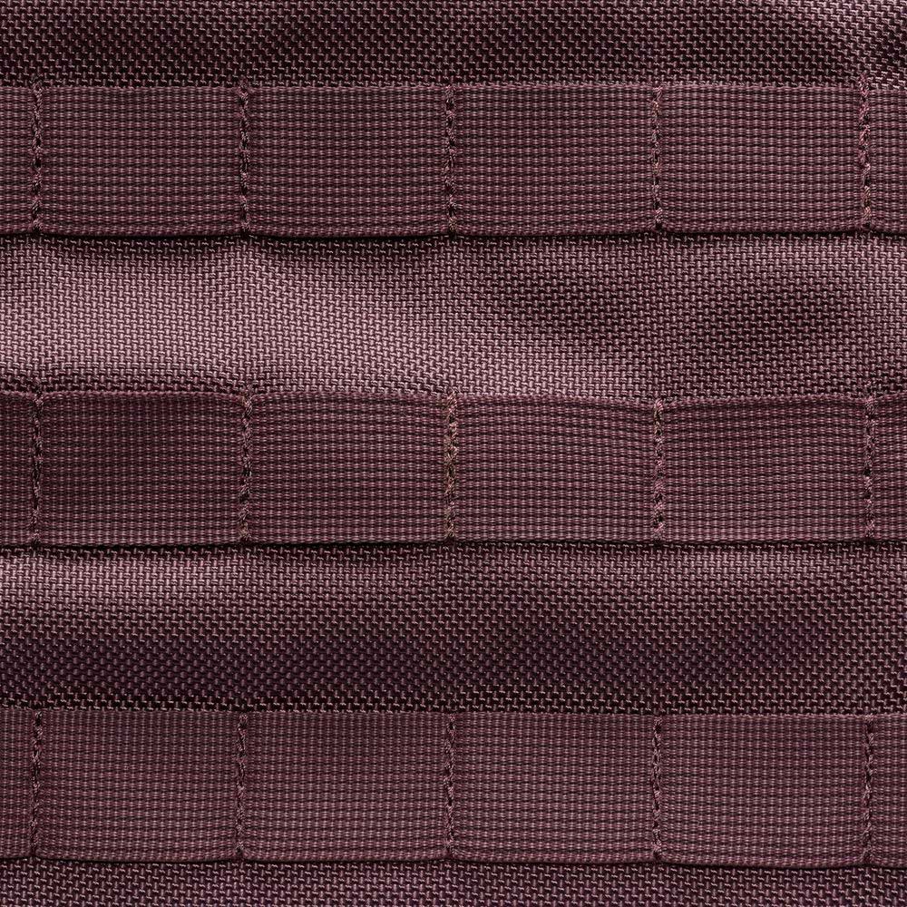 Close-up of brown nylon webbing with grid-like stitching, a signature MOLLE feature on water-resistant skateboarding bags such as the Tattoo Black Light Violet FD7544502 Nike SB RPM Skate Backpack.