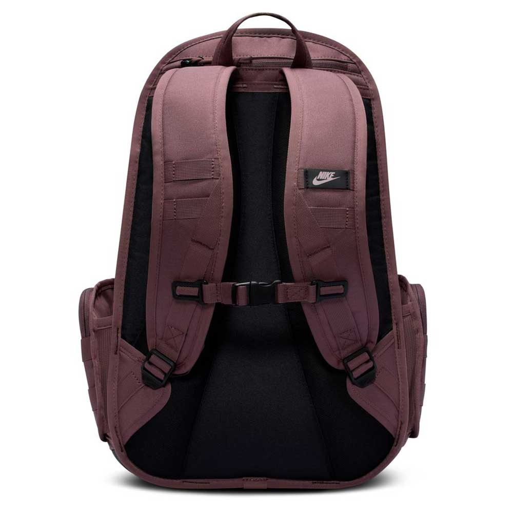 The Tattoo Black Light Violet FD7544502 Nike SB RPM Skate Backpack is shown from the back, featuring padded shoulder straps, a sternum strap, side pockets, and a small Nike logo patch—ideal for skateboarding.