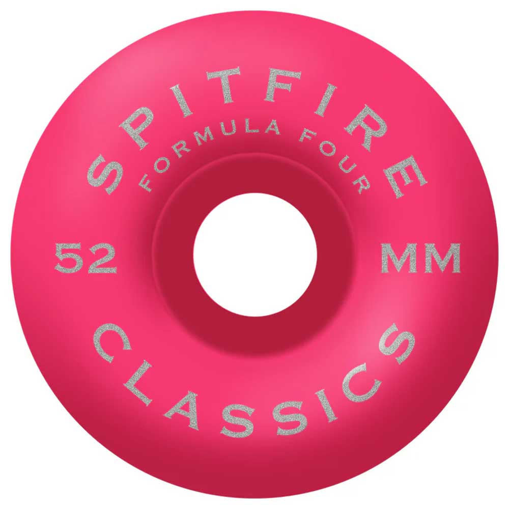 The Team Floral Pink 52mm99A Formula Four Spitfire Wheels Classic is a pink skateboard wheel with silver text reading SPITFIRE FORMULA FOUR 52mm CLASSICS.