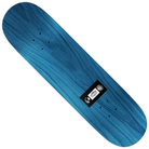 The Team Non-Fiction 8.38 Real Skateboards Deck is a blue wooden skateboard deck with a subtle wood grain pattern, shown from above. A black rectangular object with a metal part and white label is attached at the center; no wheels or trucks are included.