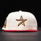 The Final Hour New Era Hat 5950 Fitted NEW YEAR DROP features a white design with a gold, black, and white star logo on the front and a red brim, shown against a black background.