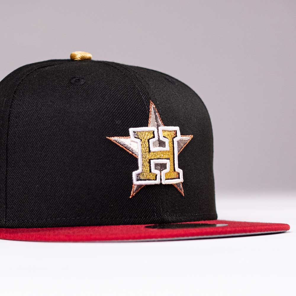 The Last Call New Era Hat 5950 Fitted NEW YEAR DROP features a black crown, red brim, and a gold and white H on a star emblem embroidered on the front. Plain light gray background. Last Call—grab yours now!.