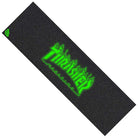 A black Thrasher Flame Glow Logo Grip Tape 10in x 33in Sheet Graphic Mob skateboard grip tape featuring “Thrasher Magazine” written in green flame-styled letters across the center, with a small green MOB Grip logo in the top left corner.