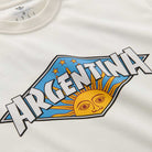 The Thrasher Magazine x Adidas AFA Tee White KX4544 combines vibrant sun, blue sky, stars, and bold ARGENTINA text—ideal for Argentina football fans or as standout streetwear from Adidas Skateboarding.