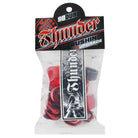 A clear plastic bag holds red Thunder Bushings Rebuild Kit 90A Durometer bushings for skateboard trucks and a black-and-white Thunder sticker; packaging reads Thunder Bushing Upgrade and is part of the Thunder Rebuild Kit.