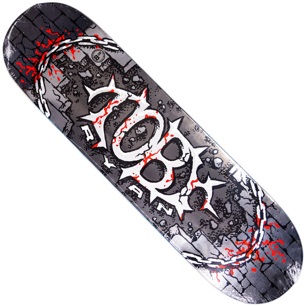The Toby Ryan Pro Oval 8.06 Deck from Real Skateboards features a dark, graffiti-inspired design with bold barbed wire, brick patterns, and prominent “100” lettering. Red splatters highlight the mostly black, white, and gray colorway, reflecting the deck’s edgy street aesthetic influenced by Toby Ryan’s signature style.