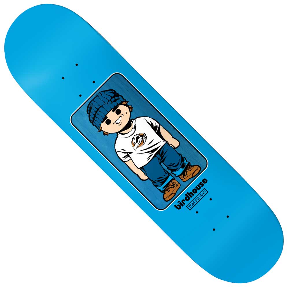 The Tom Scharr Toybox 8.38 Birdhouse Skateboards Deck showcases a blue background with a cartoon boy in a beanie, white shirt, and blue jeans standing with his hands in his pockets. The design, inspired by Tom Scharr, is completed with the Birdhouse logo beneath the artwork.