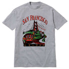 Tourist GX1000 Tee Heather Gray showcasing vibrant artwork of the Golden Gate Bridge, a cable car, houses, and trees—perfect for any tourist—with “SAN FRANCISCO” in red above and “GX1000” in yellow below.
