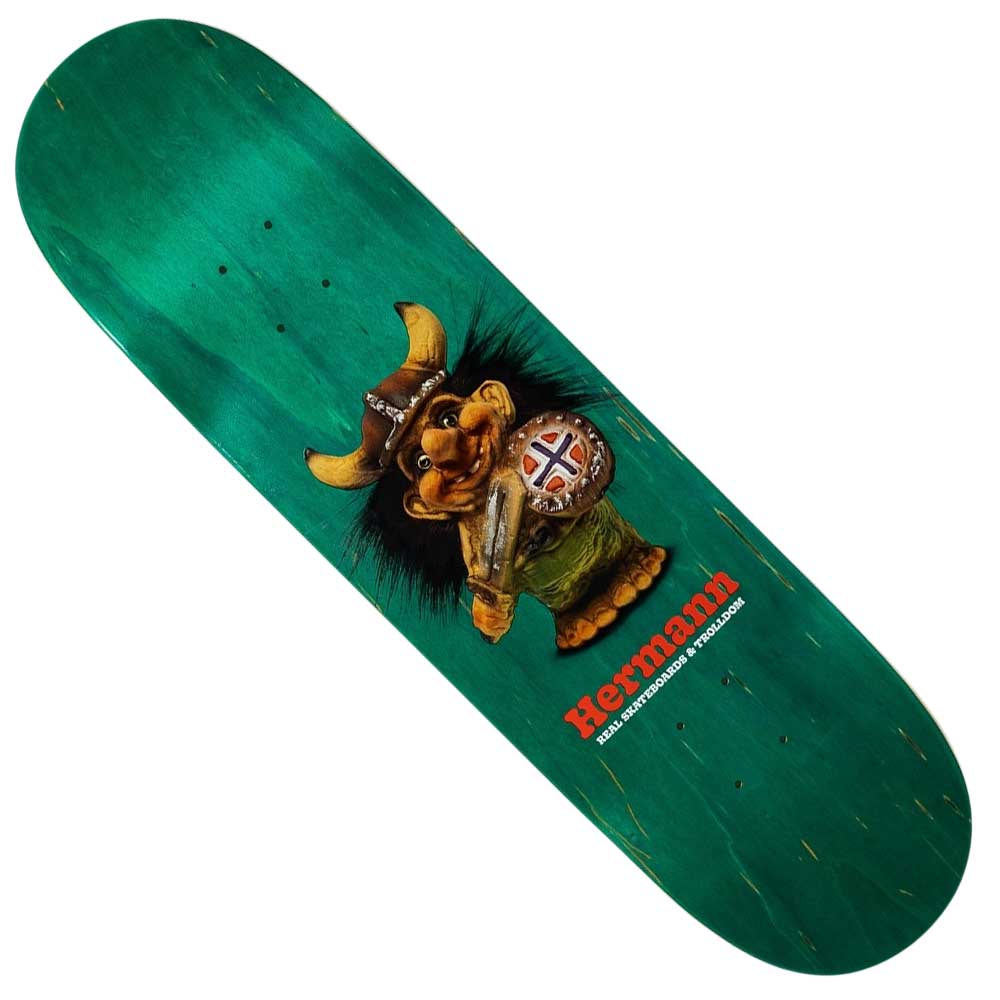 The Trolldom Hermann 8.5" Real Skateboard Deck features a cartoon Viking troll with a club and shield, the name Trolldom Hermann, red text below, and comes in various bottom stains.