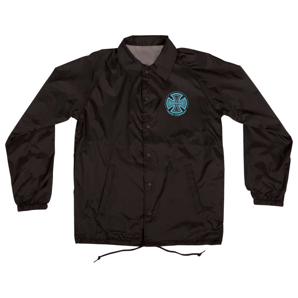 The Truck Co Legacy Coach Windbreaker Longsleeve Jacket in Black Blue for men by Independent features snap buttons, elastic cuffs, front pockets, long sleeves, and a blue circular chest logo—ideal as a skate or windbreaker jacket.