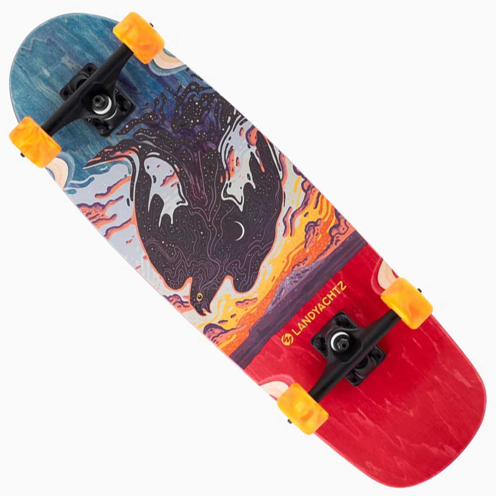 The Tugboat Nightfall Landyachtz Complete Skateboard features yellow Hawgs wheels and a vibrant deck with two black whales swimming through ocean waves beneath a sunset, crafted from Canadian maple with the brand’s name on the red lower half.