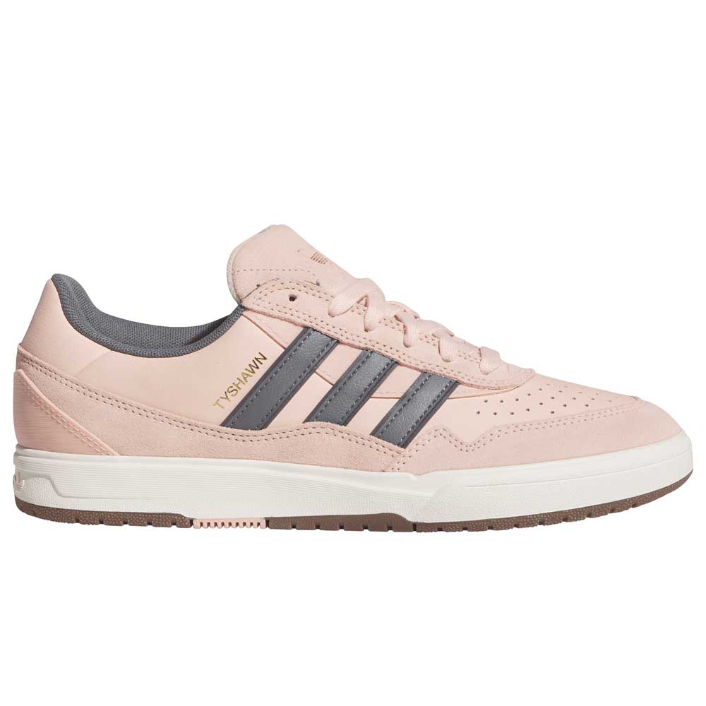 The Tyshawn 2 II Pink Green HQ4733 Adidas Skateboarding Shoes feature light pink uppers, gray stripes and heel, gold “TYSHAWN” lettering, a white midsole, and brown textured outsole—an iconic addition to the collection.