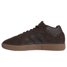 The Tyshawn HQ4740 Brown Gum Adidas Skateboarding Shoes feature a brown suede upper, black side stripes, brown laces, quilted heel detail, and a durable gum sole—ideal for skaters seeking both style and performance.